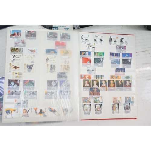 429 - Large collection of British stamps & first day covers contained within nine albums, to include mint ... 