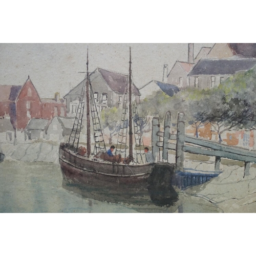 497 - Early 20th Century watercolour, a coastal town view with moored fishing boats, 36.5 x 51.5cm, framed... 