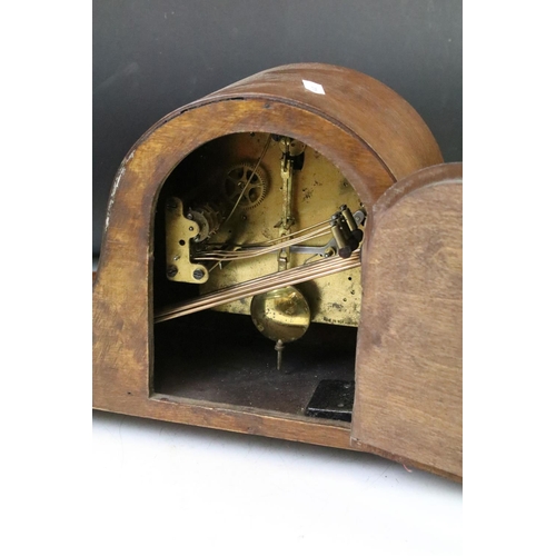 152 - Two early 20th Century mantle clock to include an oak cased Napoleons hat clock and a Smiths mahogan... 