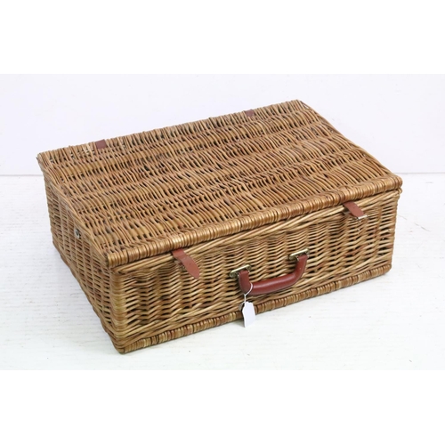 154 - Wicker basket appointed with picnic set having plates, knives and forks, cork screw, wine glasses, l... 