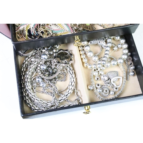 307 - Two jewellery boxes containing gold and silver rings, earrings, necklaces and costume jewellery etc.