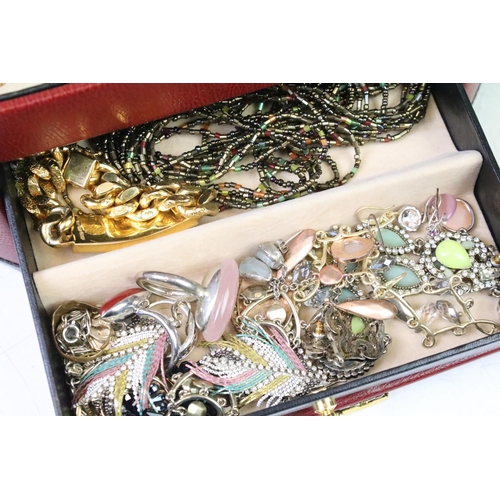 307 - Two jewellery boxes containing gold and silver rings, earrings, necklaces and costume jewellery etc.