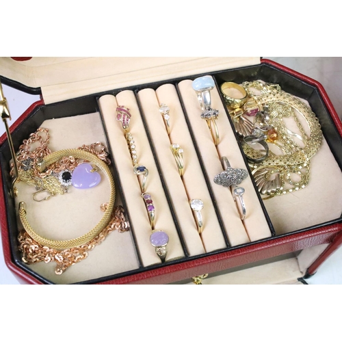 307 - Two jewellery boxes containing gold and silver rings, earrings, necklaces and costume jewellery etc.