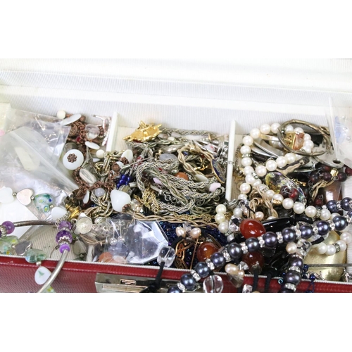 307 - Two jewellery boxes containing gold and silver rings, earrings, necklaces and costume jewellery etc.