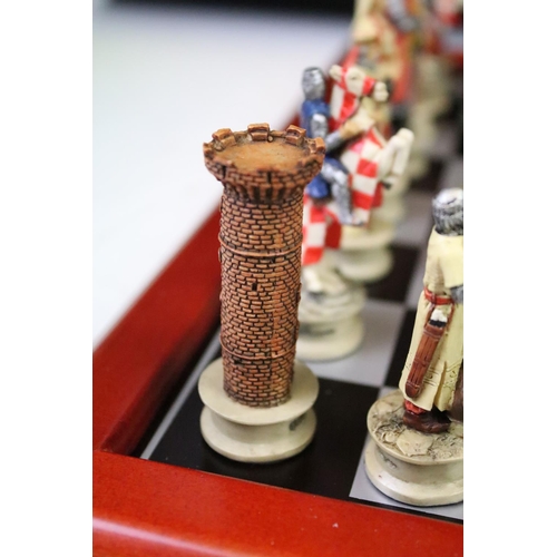 310 - A contemporary 'The Chessmen' hand painted chess set.