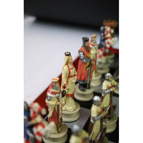 310 - A contemporary 'The Chessmen' hand painted chess set.