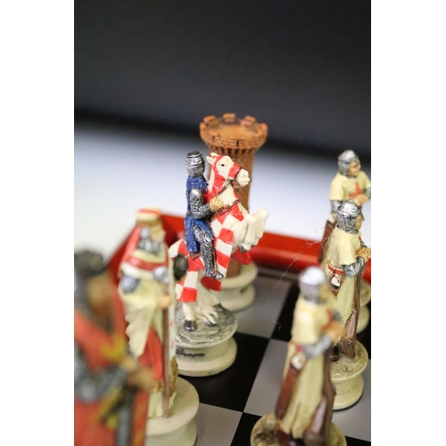 310 - A contemporary 'The Chessmen' hand painted chess set.