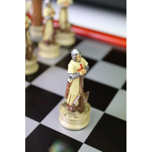 310 - A contemporary 'The Chessmen' hand painted chess set.