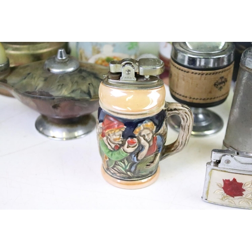 311 - A large collection of vintage and contemporary pocket and table lighters together with wooden ever-r... 