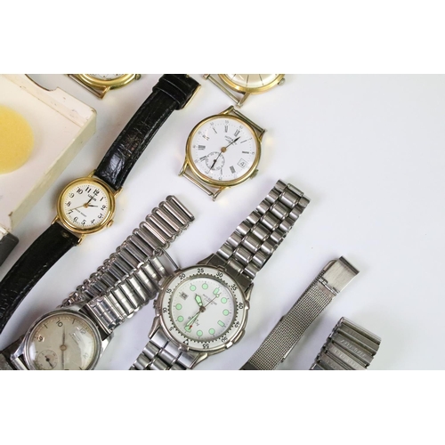 330 - A collection of vintage and contemporary ladies and gents wristwatches to include Tissot, Rotary and... 