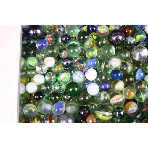 332 - A collection of mixed marbles of various sizes and colours contained within two boxes.