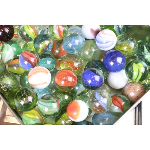 332 - A collection of mixed marbles of various sizes and colours contained within two boxes.