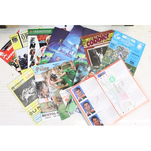 394 - Collection of Rugby programmes to include a collection of 2011 Rugby world cup programmes, three Cha... 