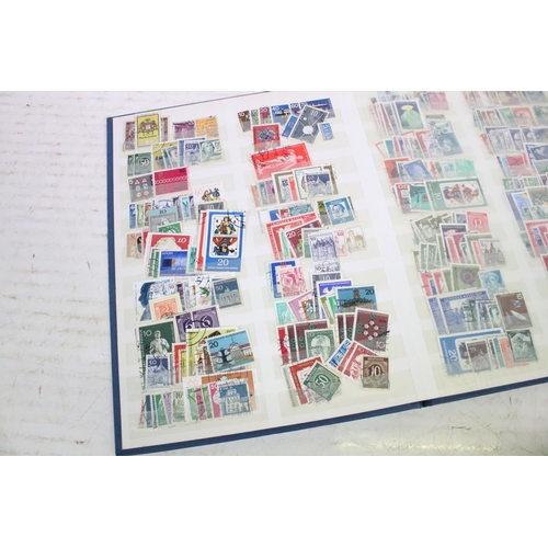 395 - Large collection of empty stamp collectors albums  together with one box of assorted world kilo ware... 