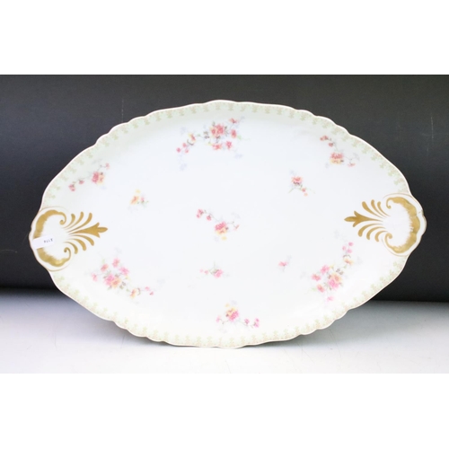 108 - Limoges extensive dinner set to include approximately; two large lidded tureens, 1 oval platters, 2 ... 