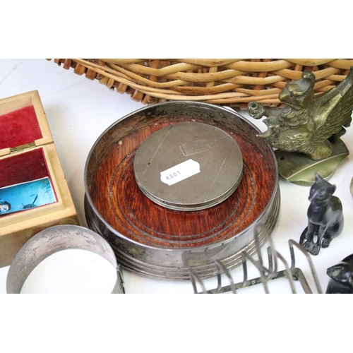 296 - A group of mixed collectables to include a sterling silver powder compact, silver bottle coaster, si... 