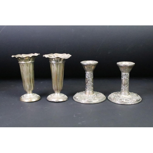 300 - A collection of mixed sterling silver to include a pair of bud vases, pair of candlesticks, vanity j... 