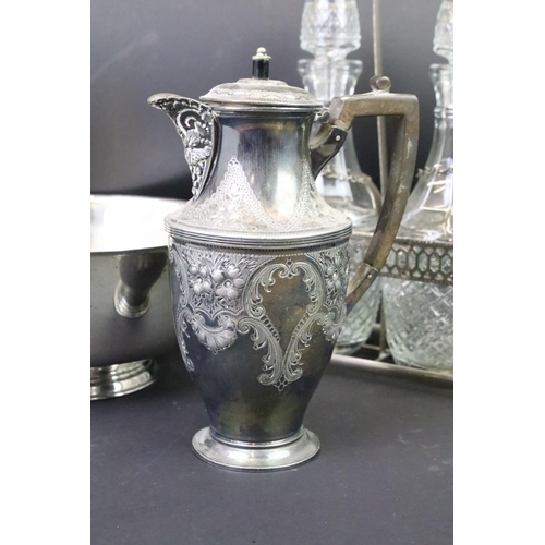 301 - A group of mixed silver plate to include decanters, napkins rings, salad bowl ....etc..