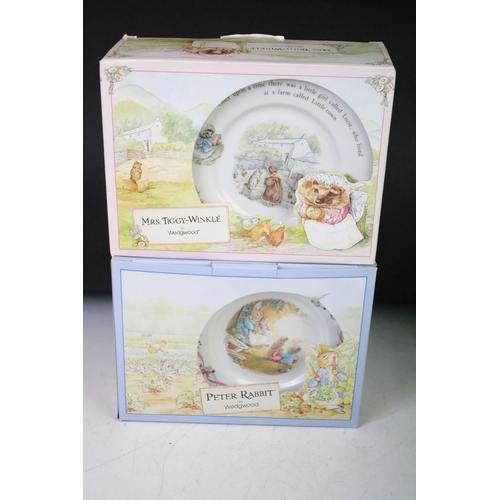 102 - Four Wedgwood Peter Rabbit mug and bowl boxed sets together with two boxed Peter Rabbit plates and o... 