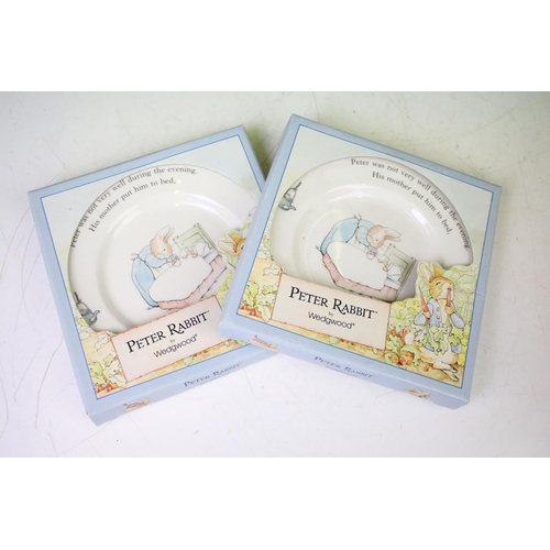 102 - Four Wedgwood Peter Rabbit mug and bowl boxed sets together with two boxed Peter Rabbit plates and o... 