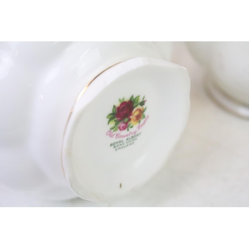 106 - Royal Albert Old Country Roses ceramics to include tea pot, cake stand, creamer jug, tea cups, coffe... 