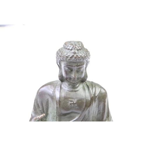 197 - A Chinese copper ornamental Tathagata Buddha Statue, measures approx 9.5cm in height x 5.6cm width.