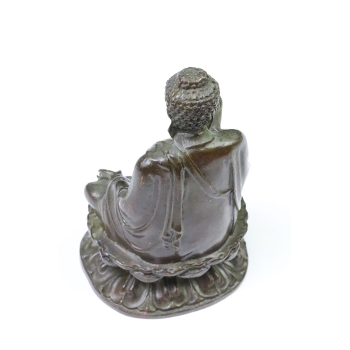 197 - A Chinese copper ornamental Tathagata Buddha Statue, measures approx 9.5cm in height x 5.6cm width.