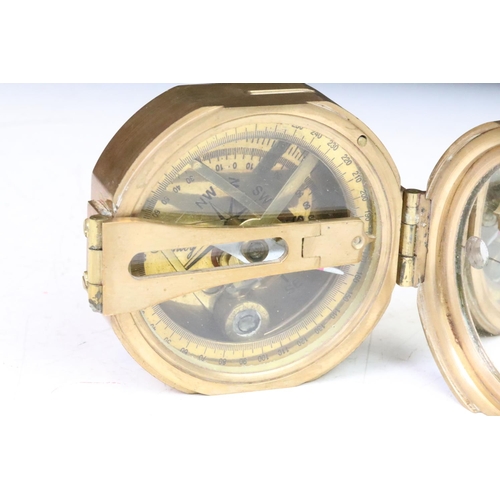 199 - A contemporary brass cased compass within fitted wooden box.