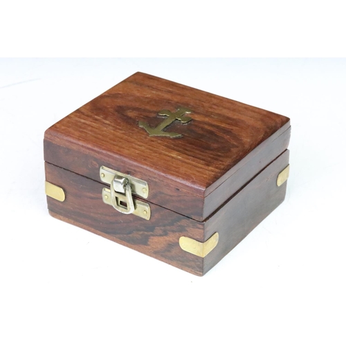 199 - A contemporary brass cased compass within fitted wooden box.