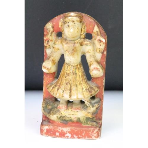 204 - A collection of four Indian carved stone hand painted figures, tallest approx 12.5cm