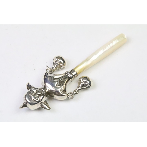 207 - Silver babies rattle with mother of pearl handle