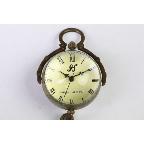 209 - Brass and glass desk ball clock