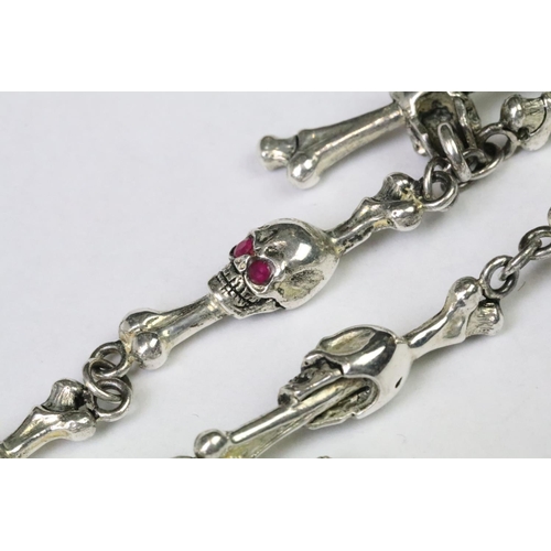 236 - Silver Albert style pocket watch chain of skulls