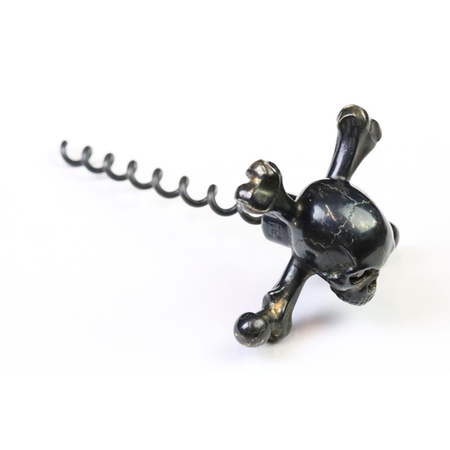 271 - A designer 'Stephen Einhorn' Gothic Skull corkscrew, blackened brass head with red crystal eyes, har... 