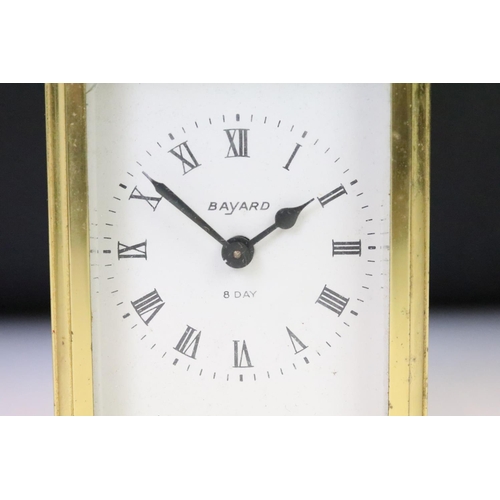 274 - A French Bayard brass cased carriage clock with beveled glass panels.