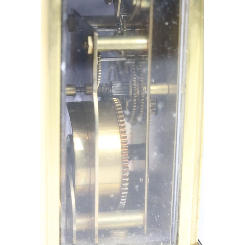 274 - A French Bayard brass cased carriage clock with beveled glass panels.