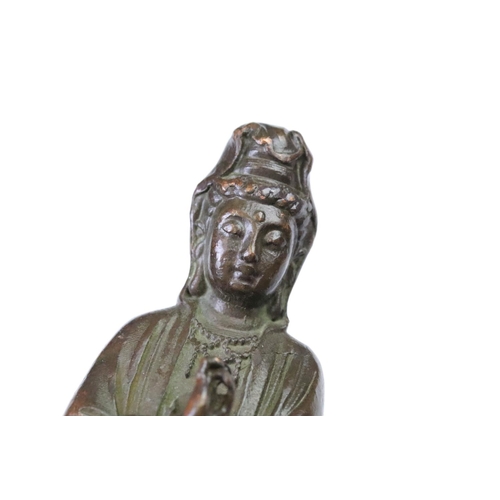 280 - A Chinese bronze Guan Yin ornamental Buddha statue, stands approx 11cm in height