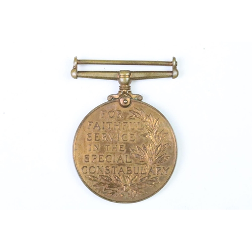 285 - A world war two era Police faithful service medal together with a quantity of coronation medals.