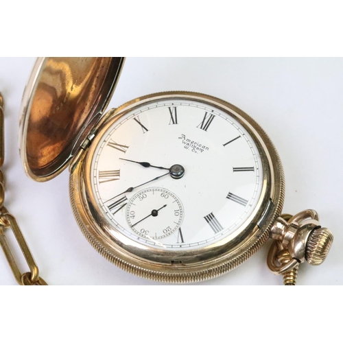 287 - A gold plated full hunter pocket watch together with fancy link albert chain.