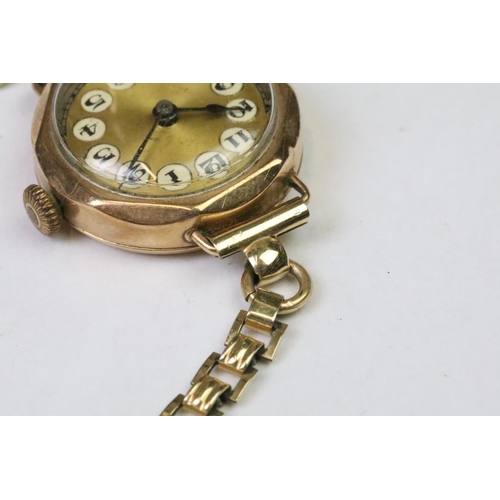 289 - An early 20th century ladies 9ct gold cased wristwatch together with a quantity of medals / medallio... 