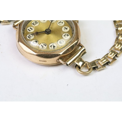 289 - An early 20th century ladies 9ct gold cased wristwatch together with a quantity of medals / medallio... 