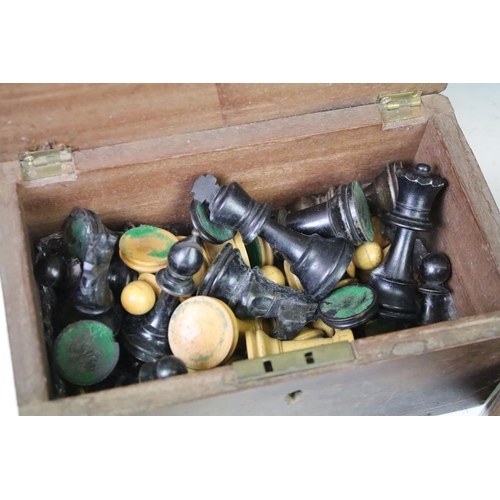 182 - A collection of mainly early 20th century boxwood chess pieces to include Jaques examples within two... 