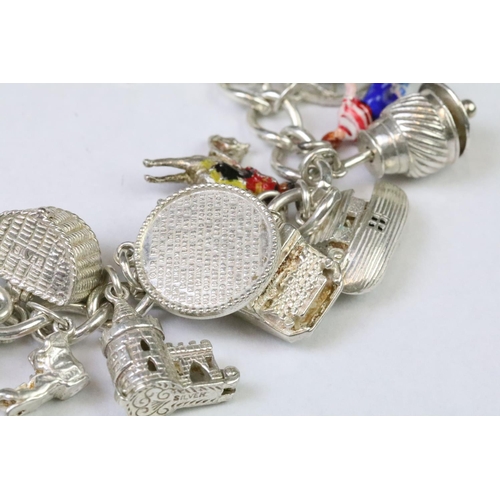 229 - A collection of sterling silver jewellery to include a charm bracelet complete with charms, silver n... 