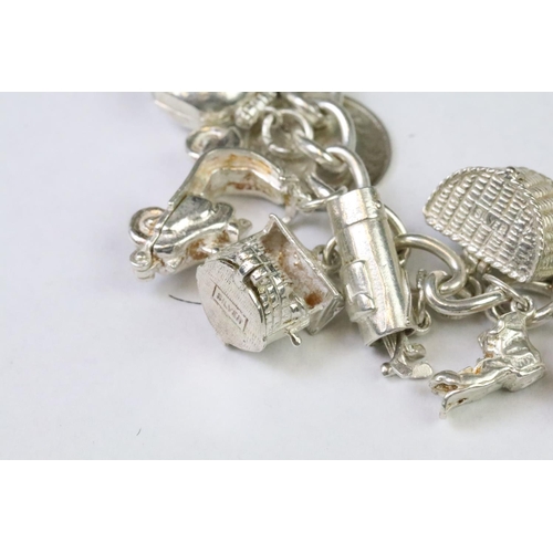 229 - A collection of sterling silver jewellery to include a charm bracelet complete with charms, silver n... 