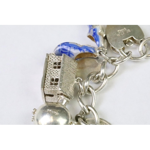 229 - A collection of sterling silver jewellery to include a charm bracelet complete with charms, silver n... 