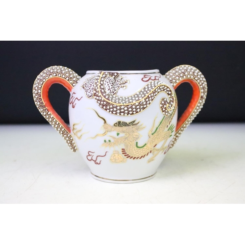 90 - Mid Century Japanese tea set having a white ground with gilt and enamelled dragon detailing, compris... 