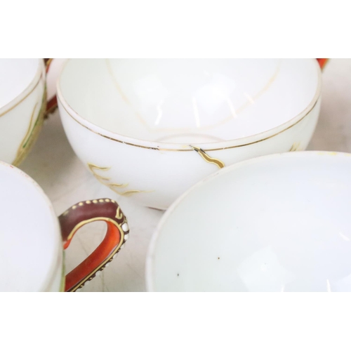 90 - Mid Century Japanese tea set having a white ground with gilt and enamelled dragon detailing, compris... 