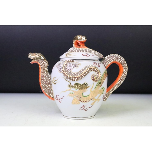 90 - Mid Century Japanese tea set having a white ground with gilt and enamelled dragon detailing, compris... 