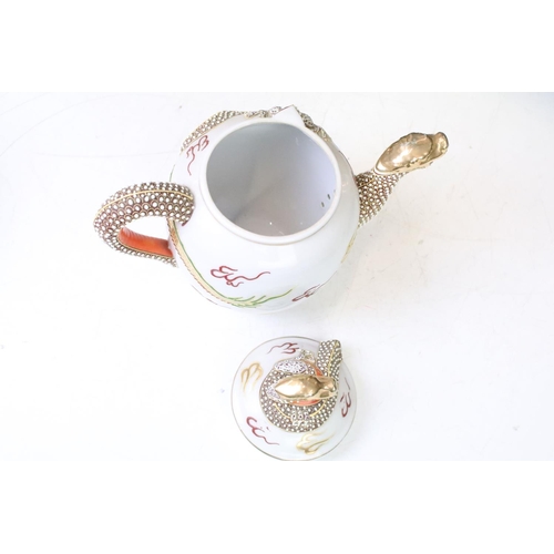 90 - Mid Century Japanese tea set having a white ground with gilt and enamelled dragon detailing, compris... 