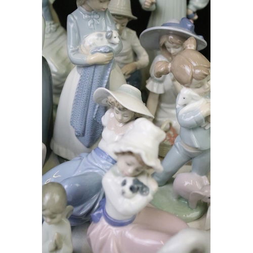 92 - Extensive collection of Spanish Nao figurines to include single figures and groups, as well as swan ... 